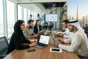 Business professionals in a UAE office using cloud-based business apps and collaboration tools.